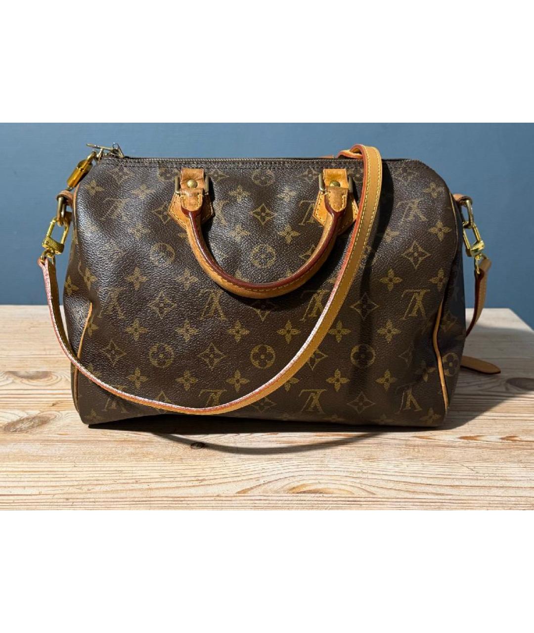 LOUIS VUITTON Коричневая кожаная сумка с короткими ручками, фото 3