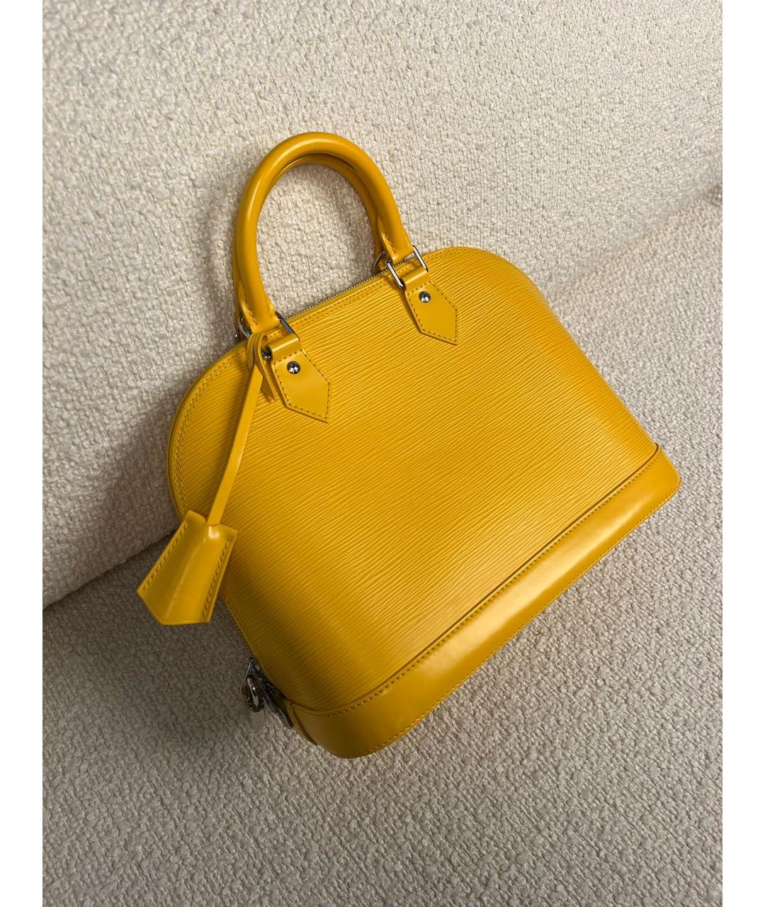 LOUIS VUITTON Горчичная кожаная сумка с короткими ручками, фото 2