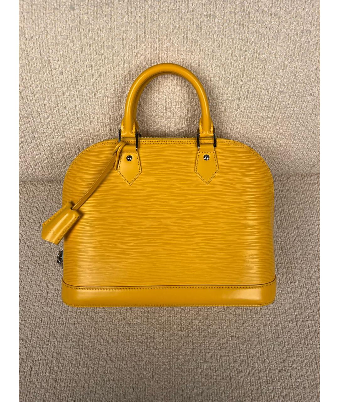 LOUIS VUITTON Горчичная кожаная сумка с короткими ручками, фото 9