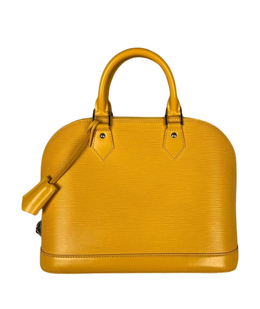 LOUIS VUITTON Горчичная кожаная сумка с короткими ручками, фото 1