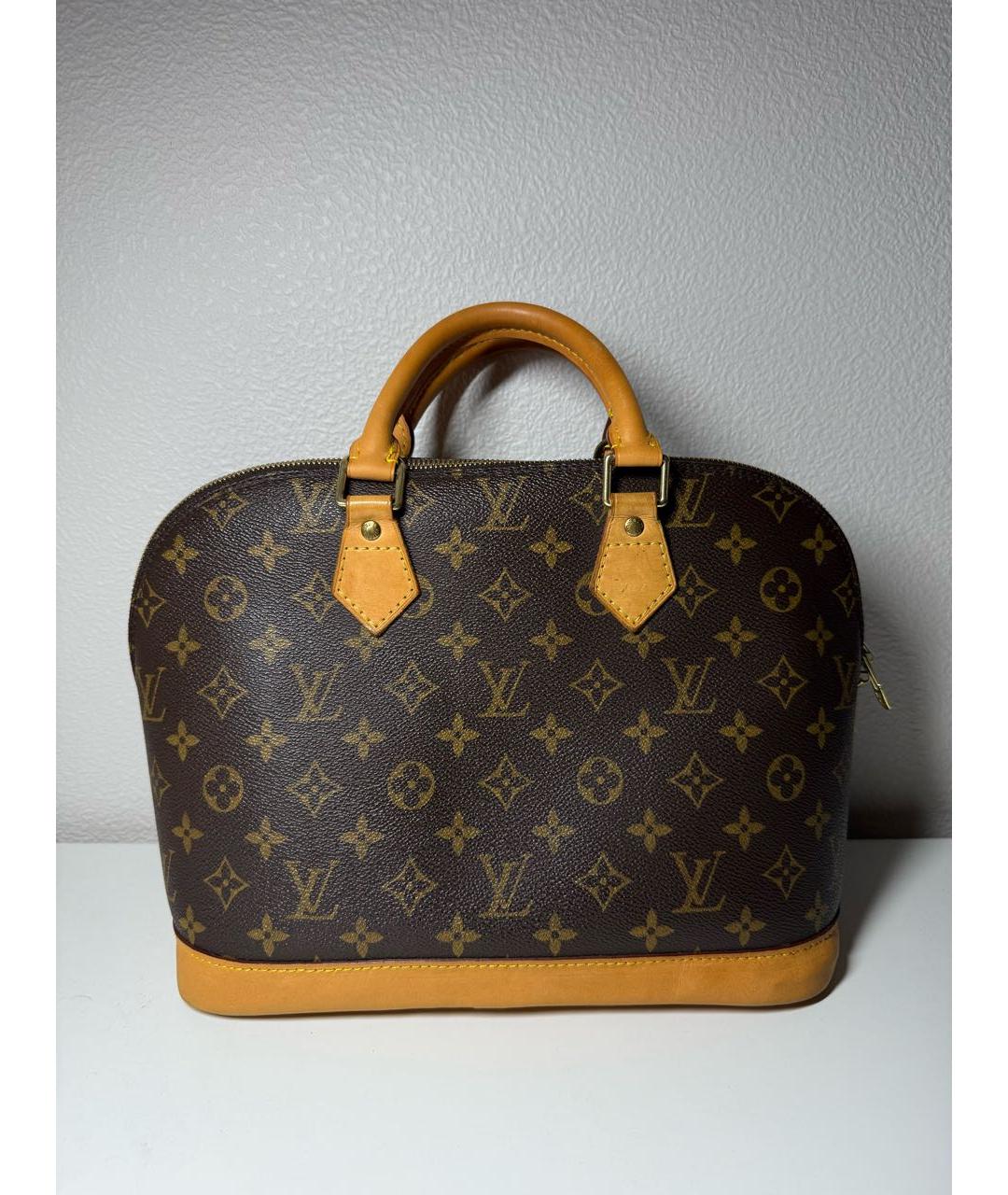 LOUIS VUITTON Коричневая кожаная сумка с короткими ручками, фото 9