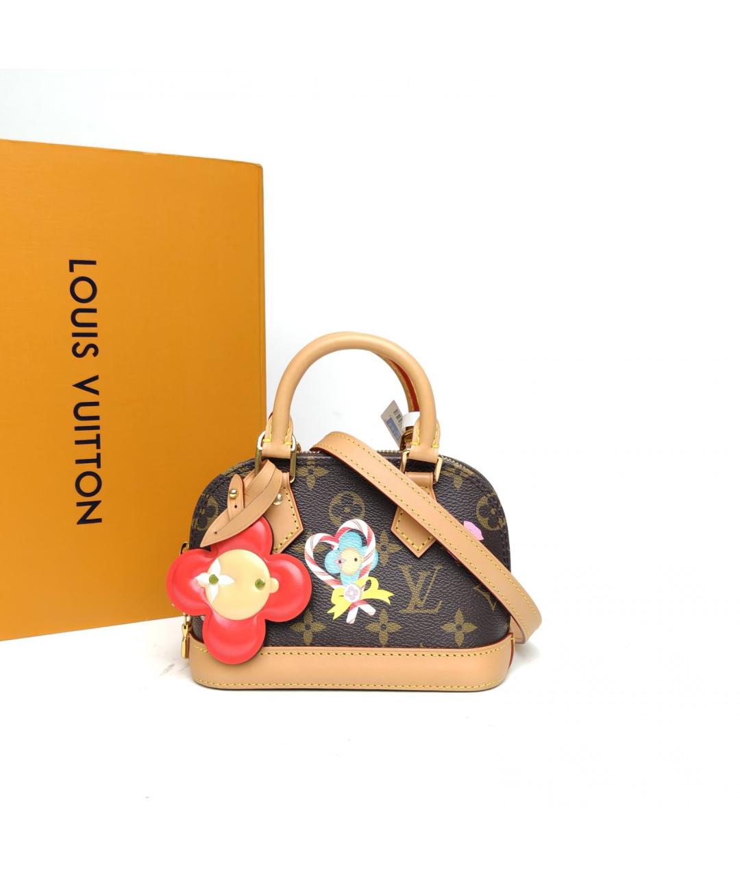 LOUIS VUITTON Коричневая кожаная сумка с короткими ручками, фото 3