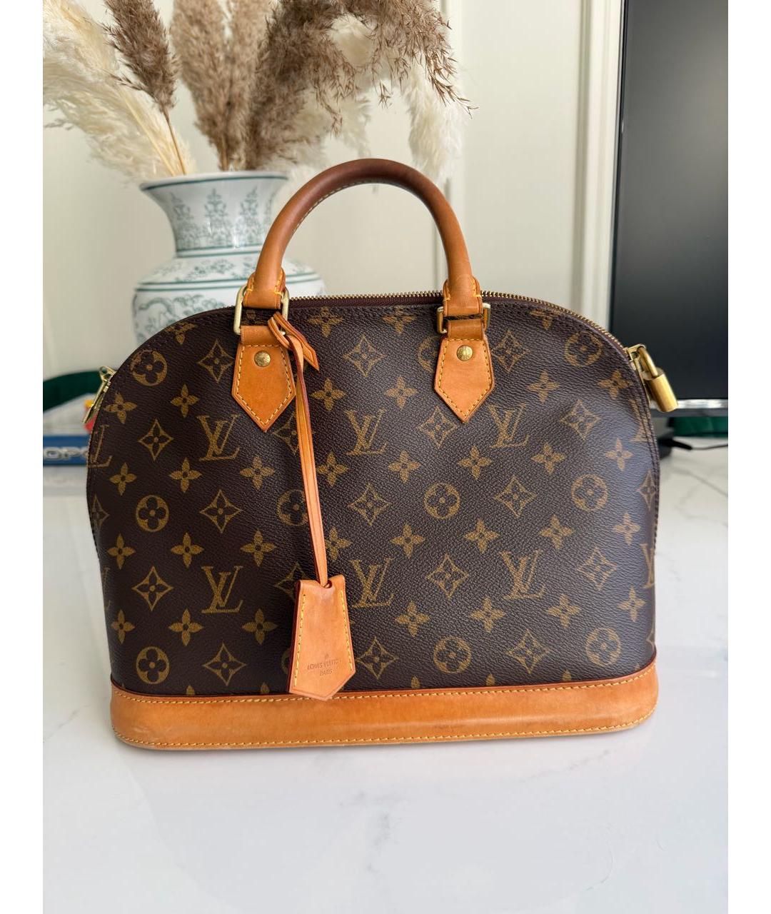 LOUIS VUITTON Коричневая кожаная сумка с короткими ручками, фото 9