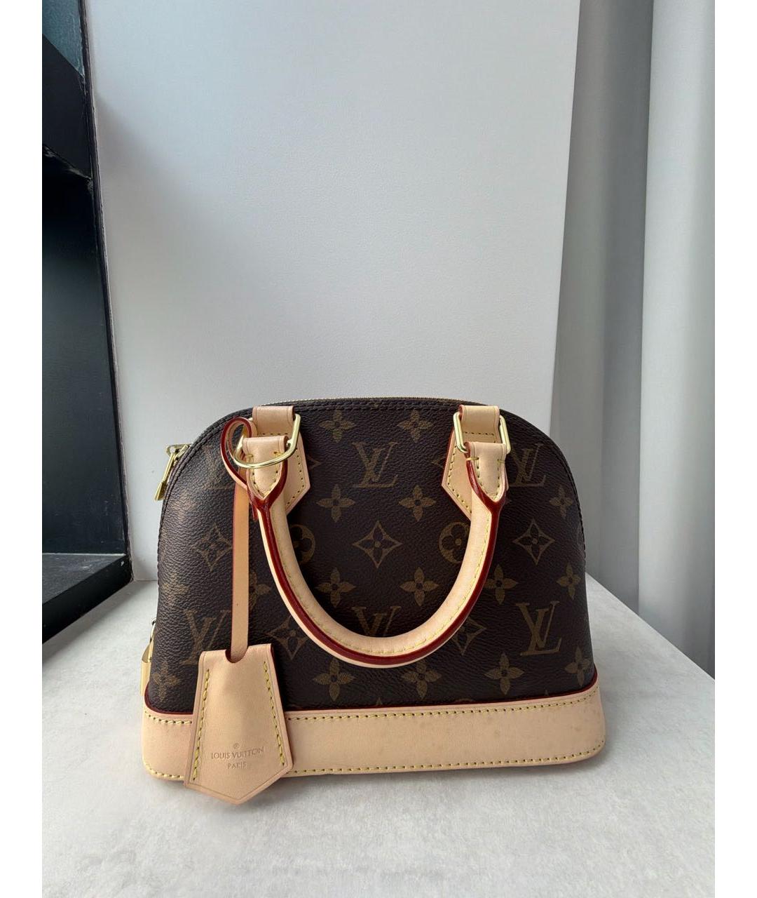 LOUIS VUITTON Коричневая кожаная сумка с короткими ручками, фото 5