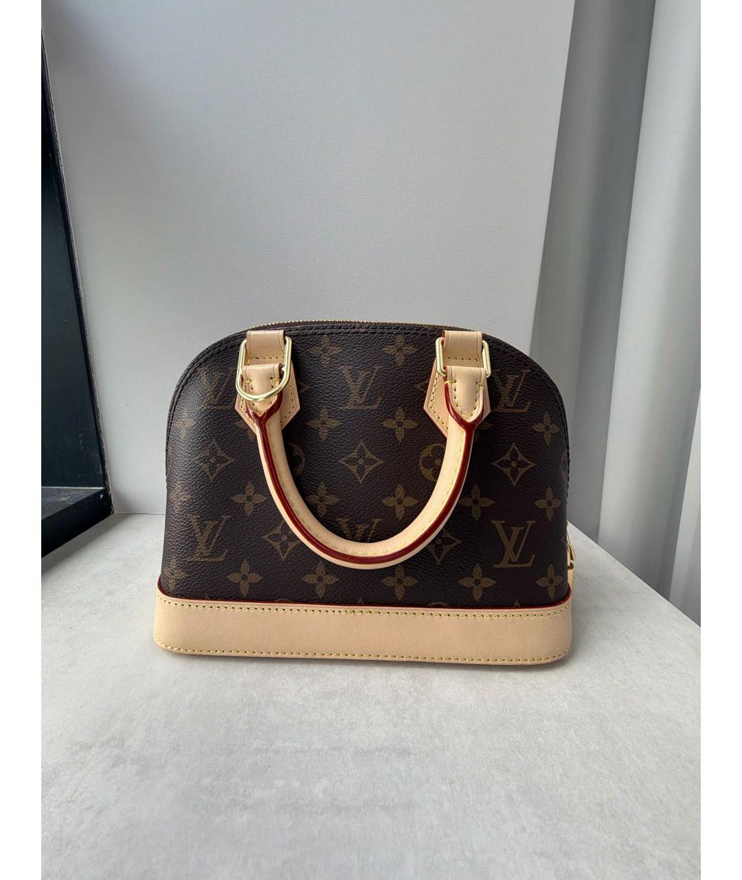 LOUIS VUITTON Коричневая кожаная сумка с короткими ручками, фото 3