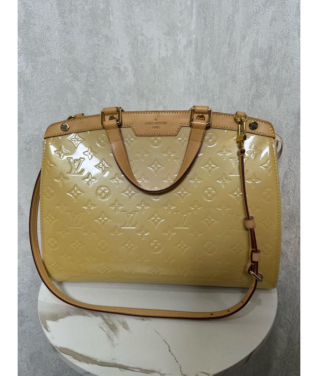 LOUIS VUITTON Золотая сумка с короткими ручками из лакированной кожи, фото 9