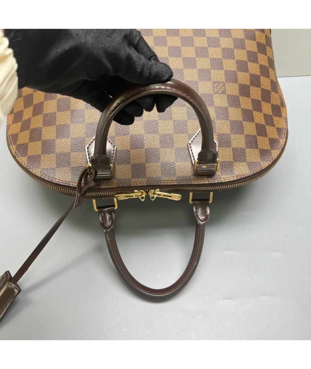 LOUIS VUITTON Коричневая кожаная сумка с короткими ручками, фото 4