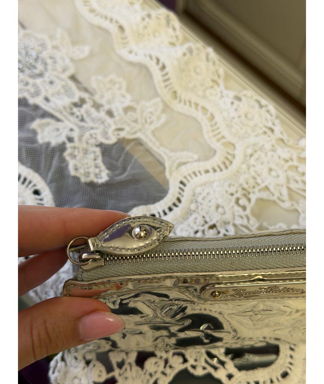 LOUIS VUITTON Серебряная кожаная косметичка, фото 6