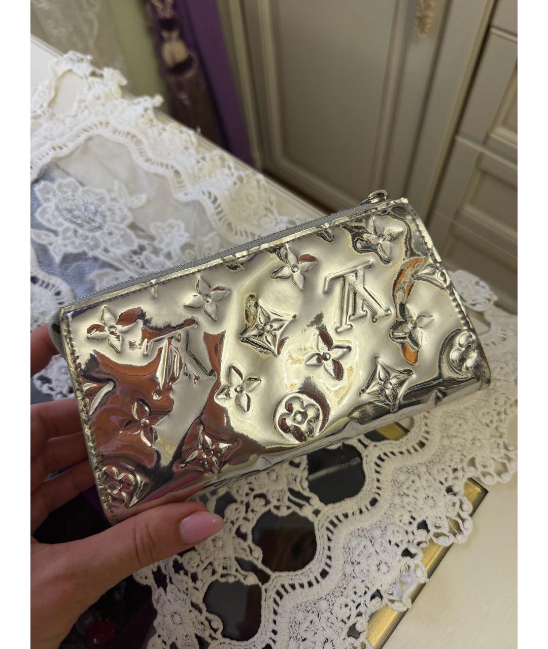 LOUIS VUITTON Серебряная кожаная косметичка, фото 3