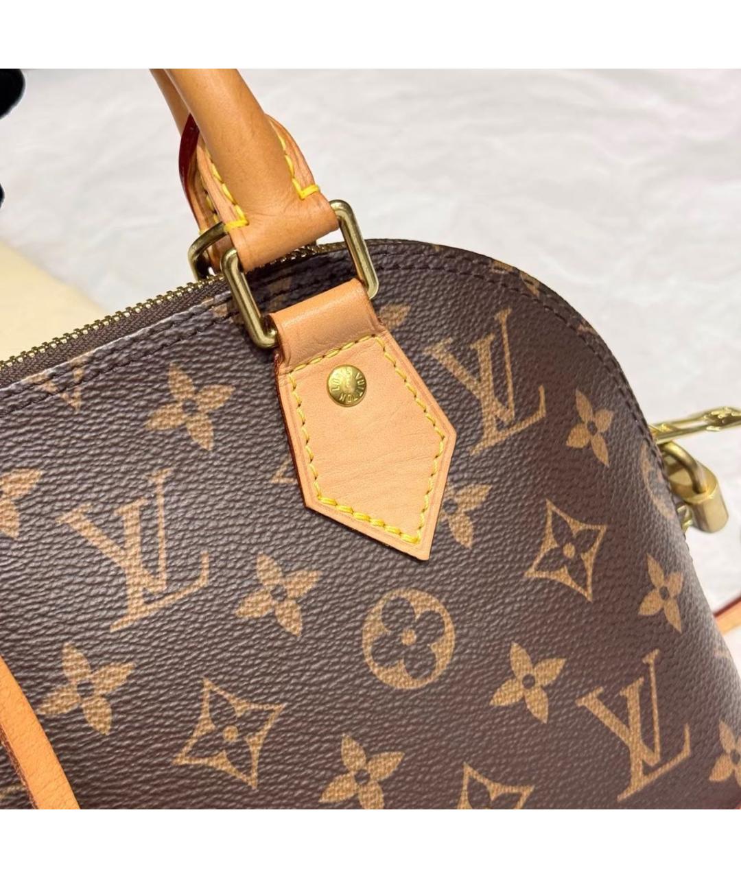 LOUIS VUITTON Коричневая кожаная сумка с короткими ручками, фото 6