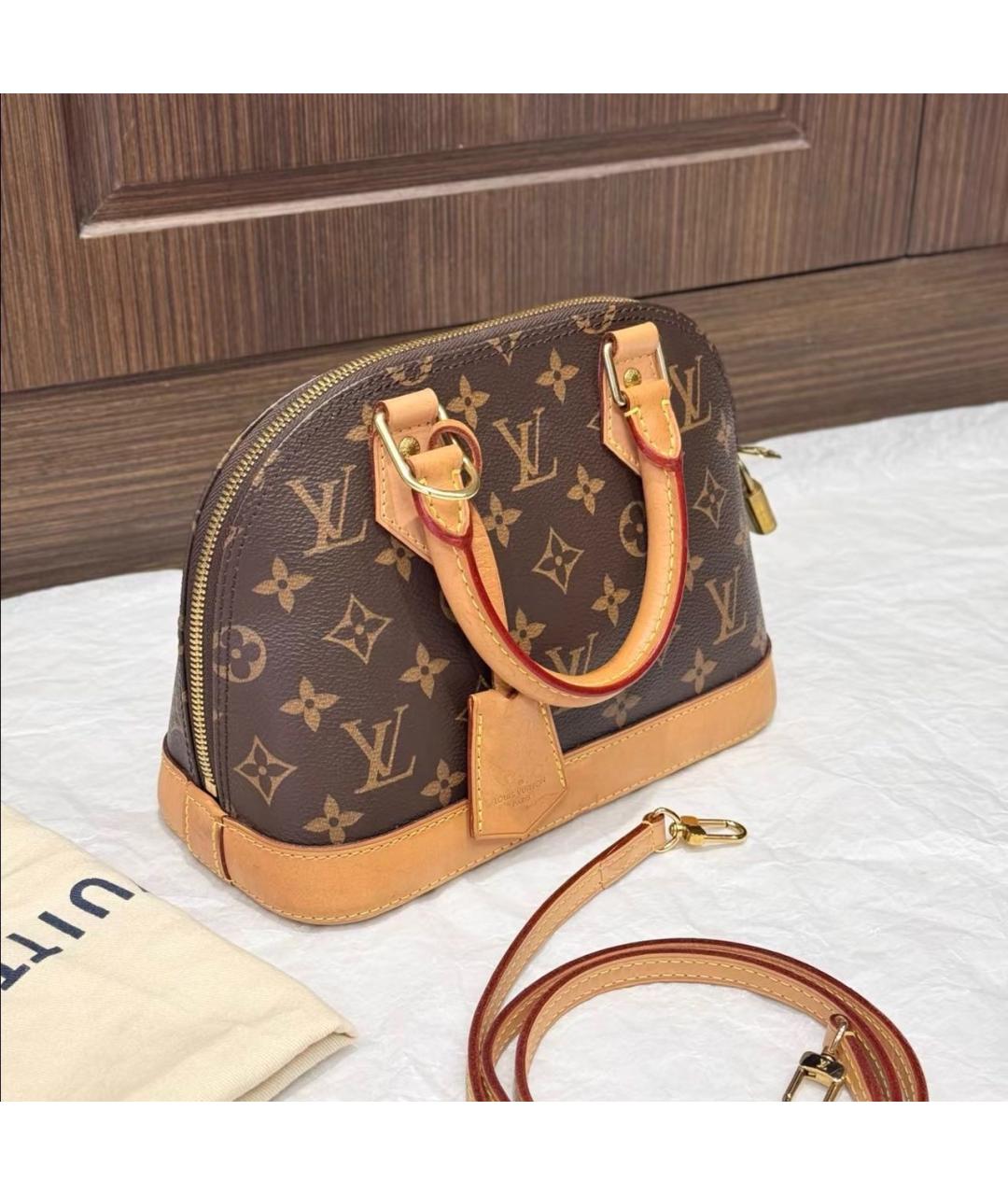 LOUIS VUITTON Коричневая кожаная сумка с короткими ручками, фото 2