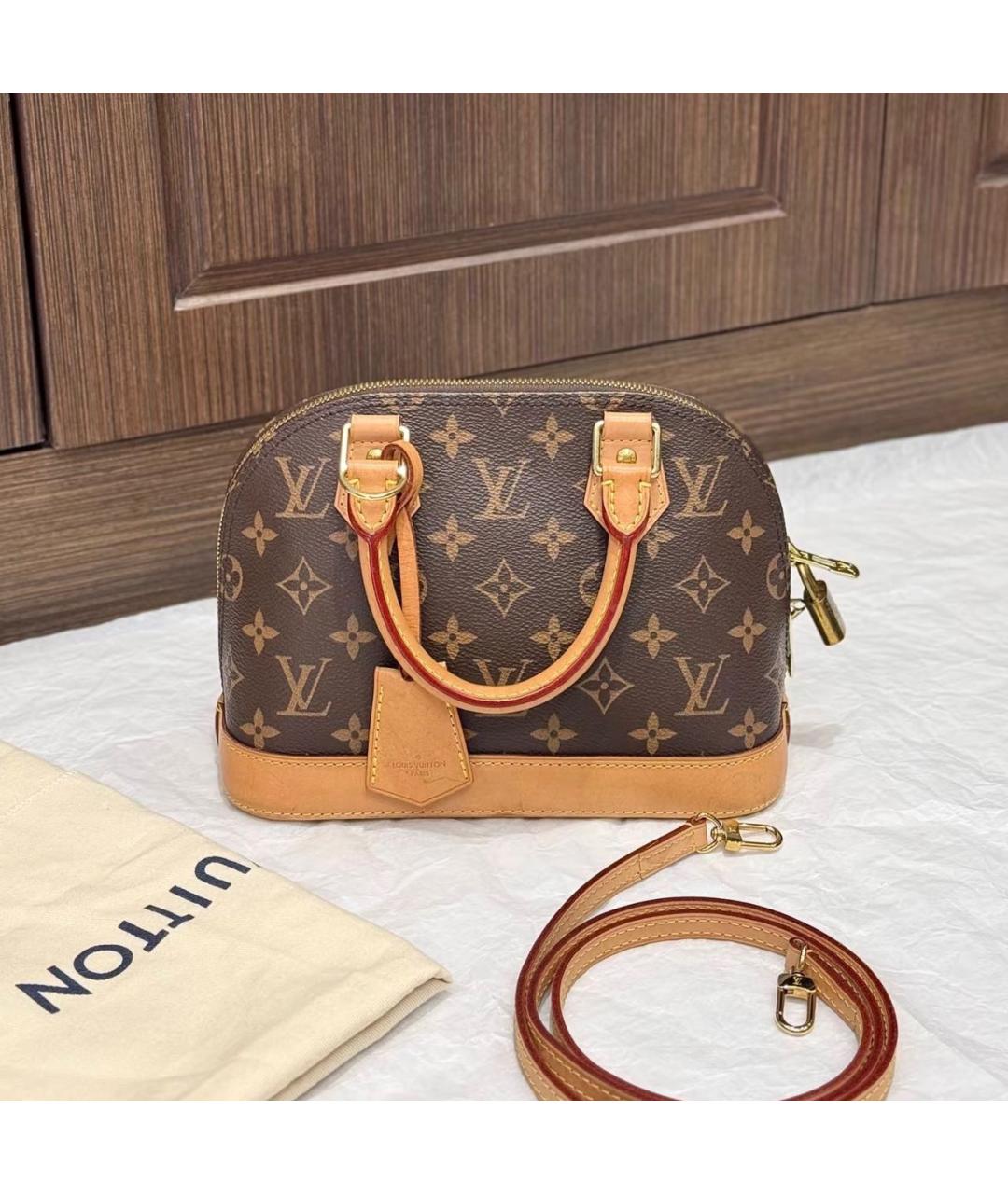 LOUIS VUITTON Коричневая кожаная сумка с короткими ручками, фото 9