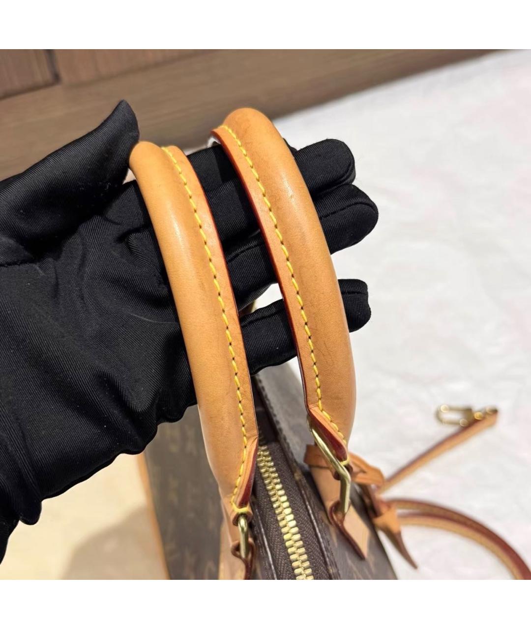 LOUIS VUITTON Коричневая кожаная сумка с короткими ручками, фото 5