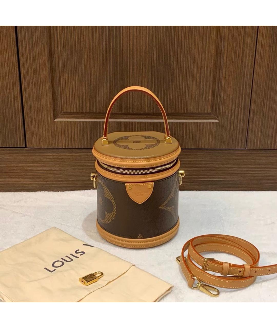 LOUIS VUITTON Коричневая кожаная сумка с короткими ручками, фото 9