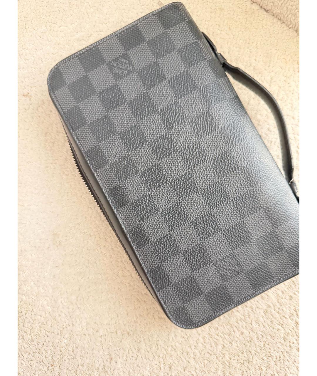 LOUIS VUITTON Черная кожаная барсетка, фото 5