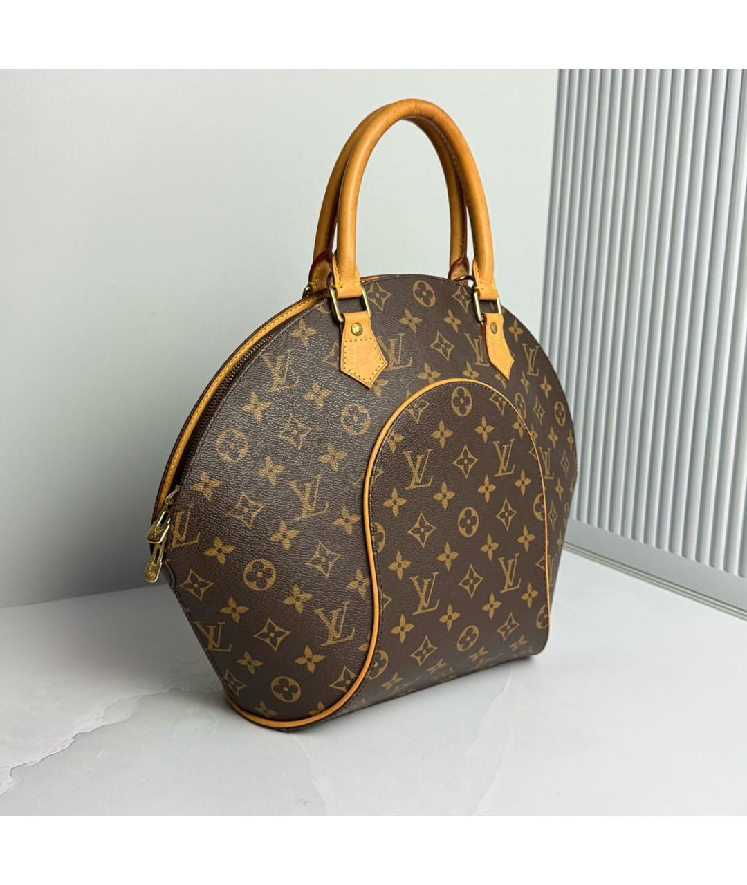 LOUIS VUITTON Коричневая сумка с короткими ручками из искусственной кожи, фото 3