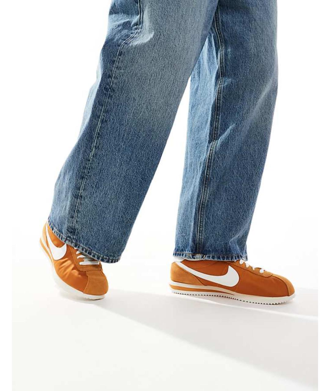 NIKE Оранжевое текстильные низкие кроссовки / кеды, фото 2