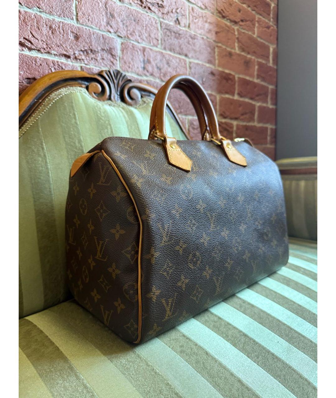 LOUIS VUITTON Коричневая кожаная сумка с короткими ручками, фото 6