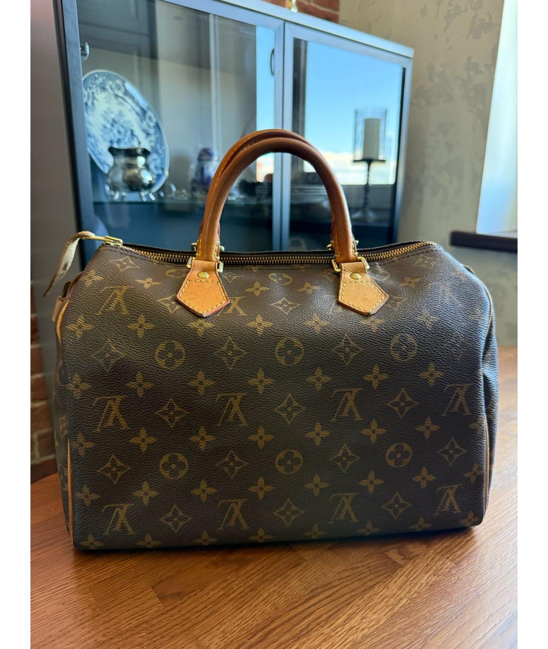 LOUIS VUITTON Коричневая кожаная сумка с короткими ручками, фото 8
