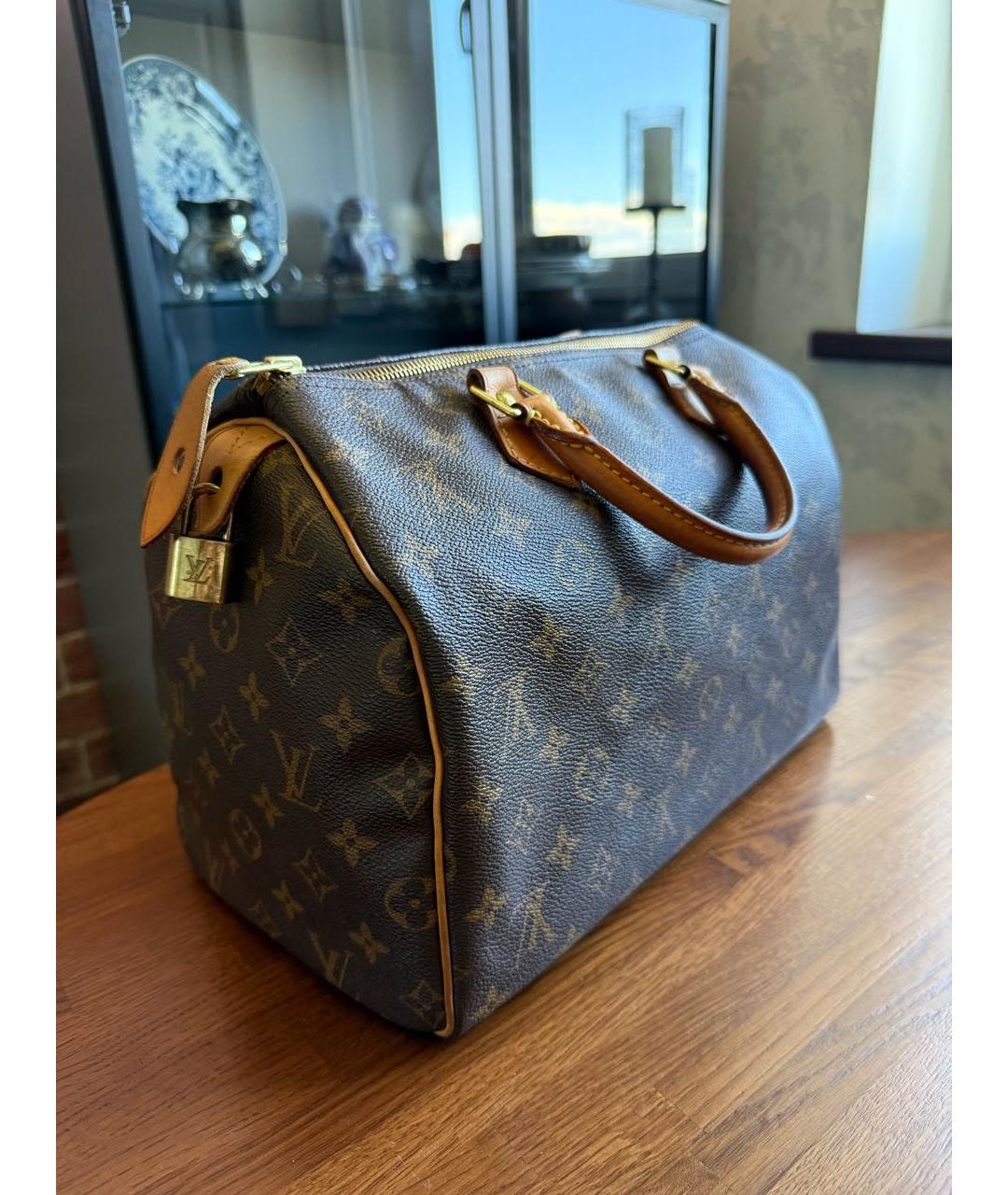 LOUIS VUITTON Коричневая кожаная сумка с короткими ручками, фото 2