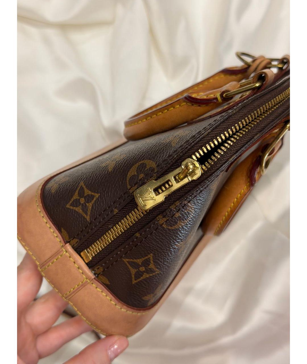 LOUIS VUITTON Кожаная сумка с короткими ручками, фото 2