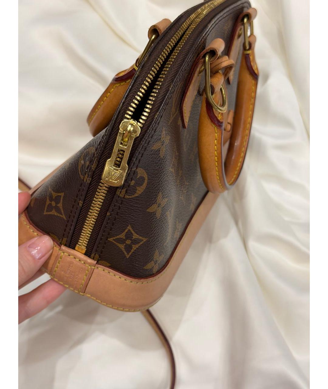 LOUIS VUITTON Кожаная сумка с короткими ручками, фото 3