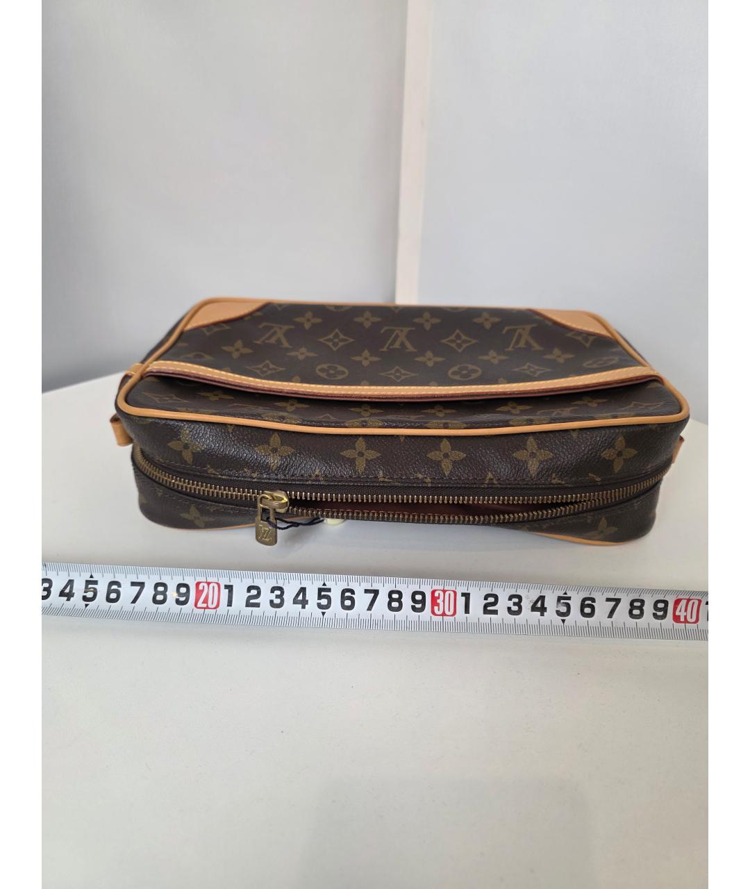 LOUIS VUITTON Коричневая косметичка из искусственной кожи, фото 5