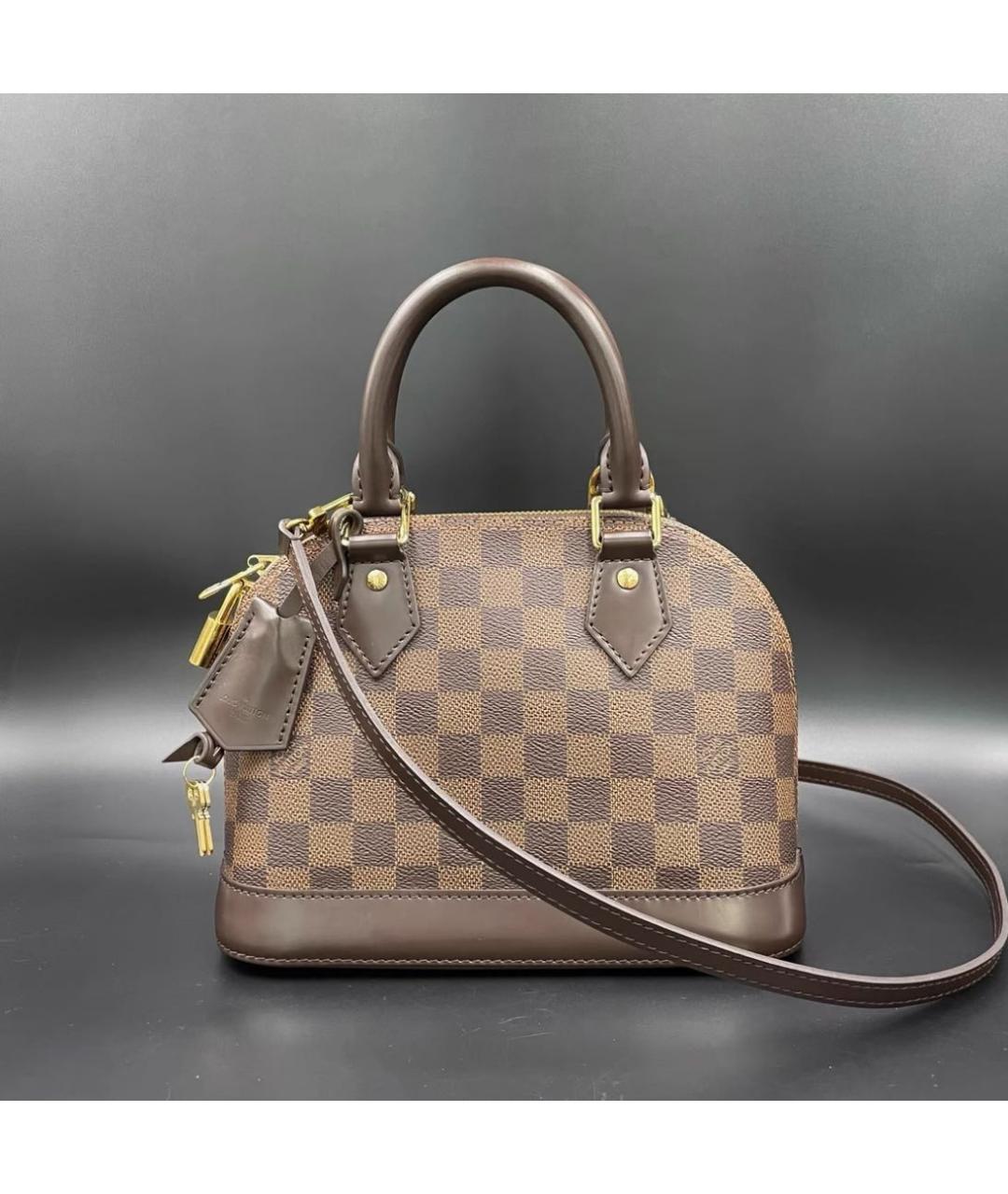 LOUIS VUITTON Коричневая кожаная сумка с короткими ручками, фото 2