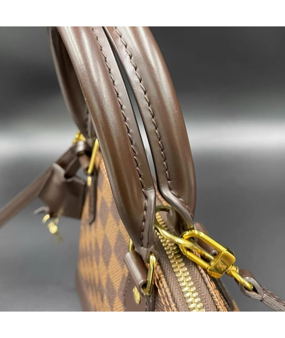 LOUIS VUITTON Коричневая кожаная сумка с короткими ручками, фото 7