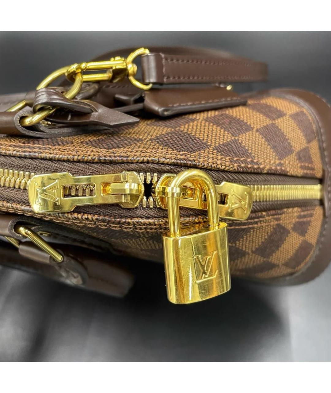 LOUIS VUITTON Коричневая кожаная сумка с короткими ручками, фото 6