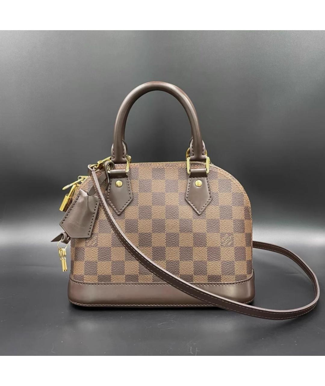 LOUIS VUITTON Коричневая кожаная сумка с короткими ручками, фото 9
