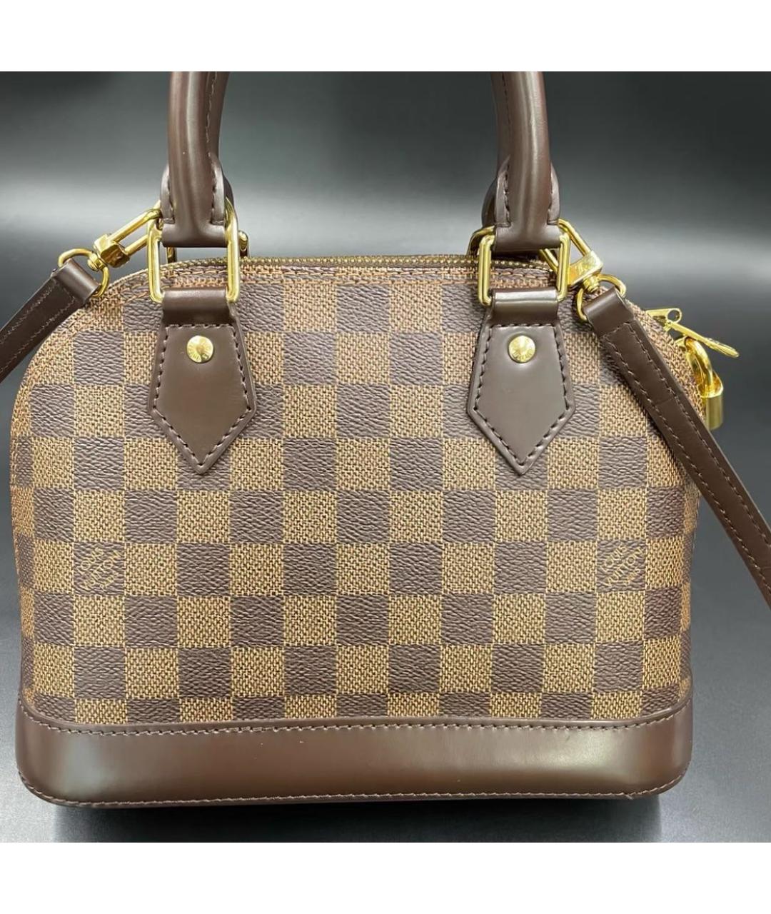 LOUIS VUITTON Коричневая кожаная сумка с короткими ручками, фото 3