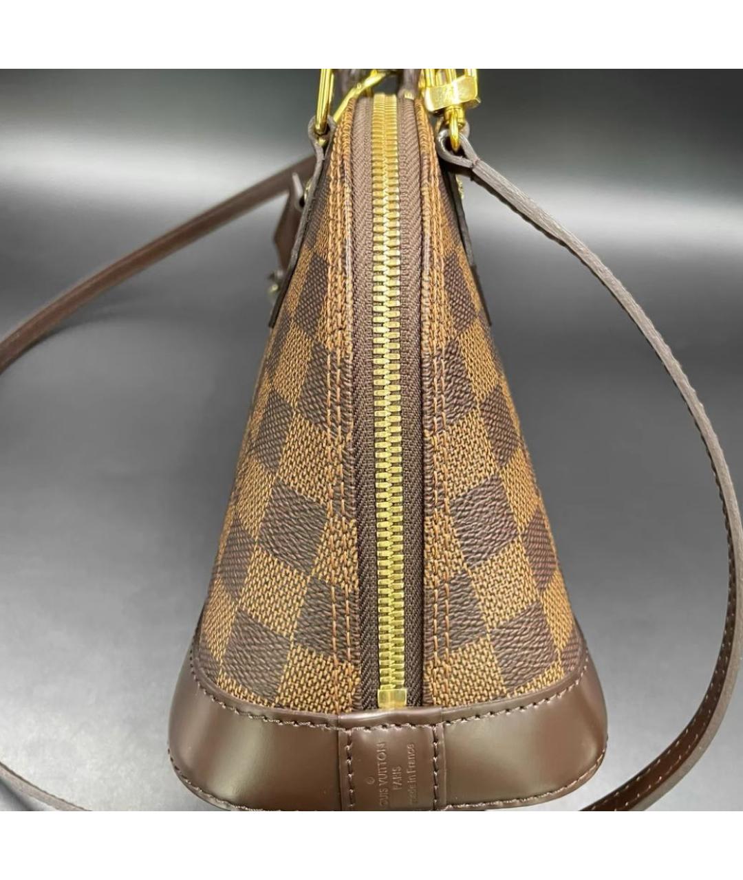 LOUIS VUITTON Коричневая кожаная сумка с короткими ручками, фото 5