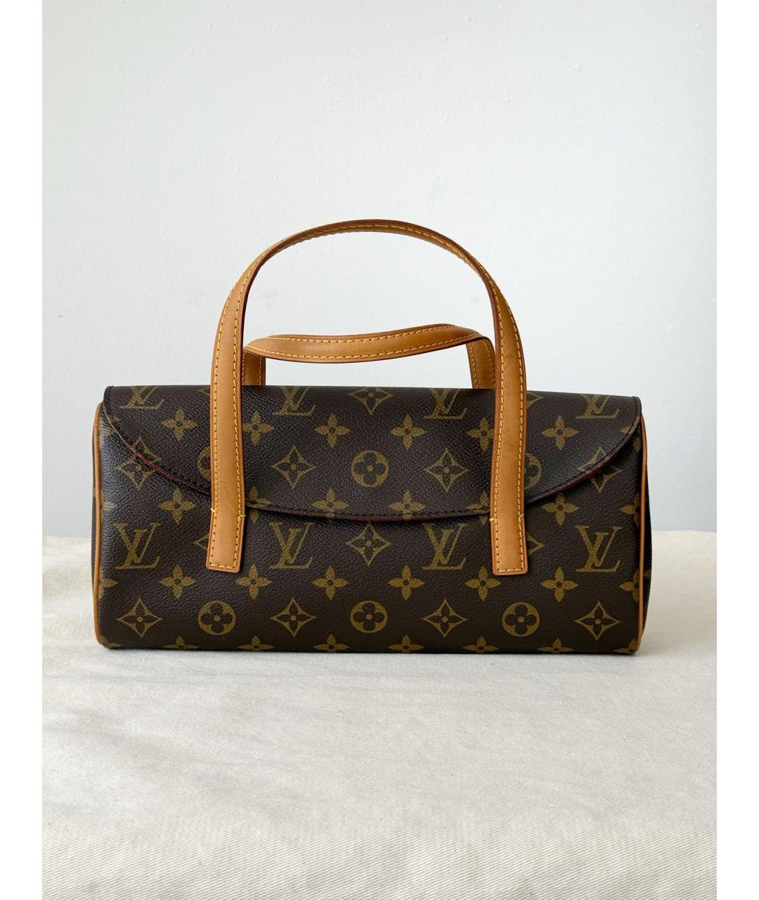 LOUIS VUITTON Коричневая кожаная сумка с короткими ручками, фото 9