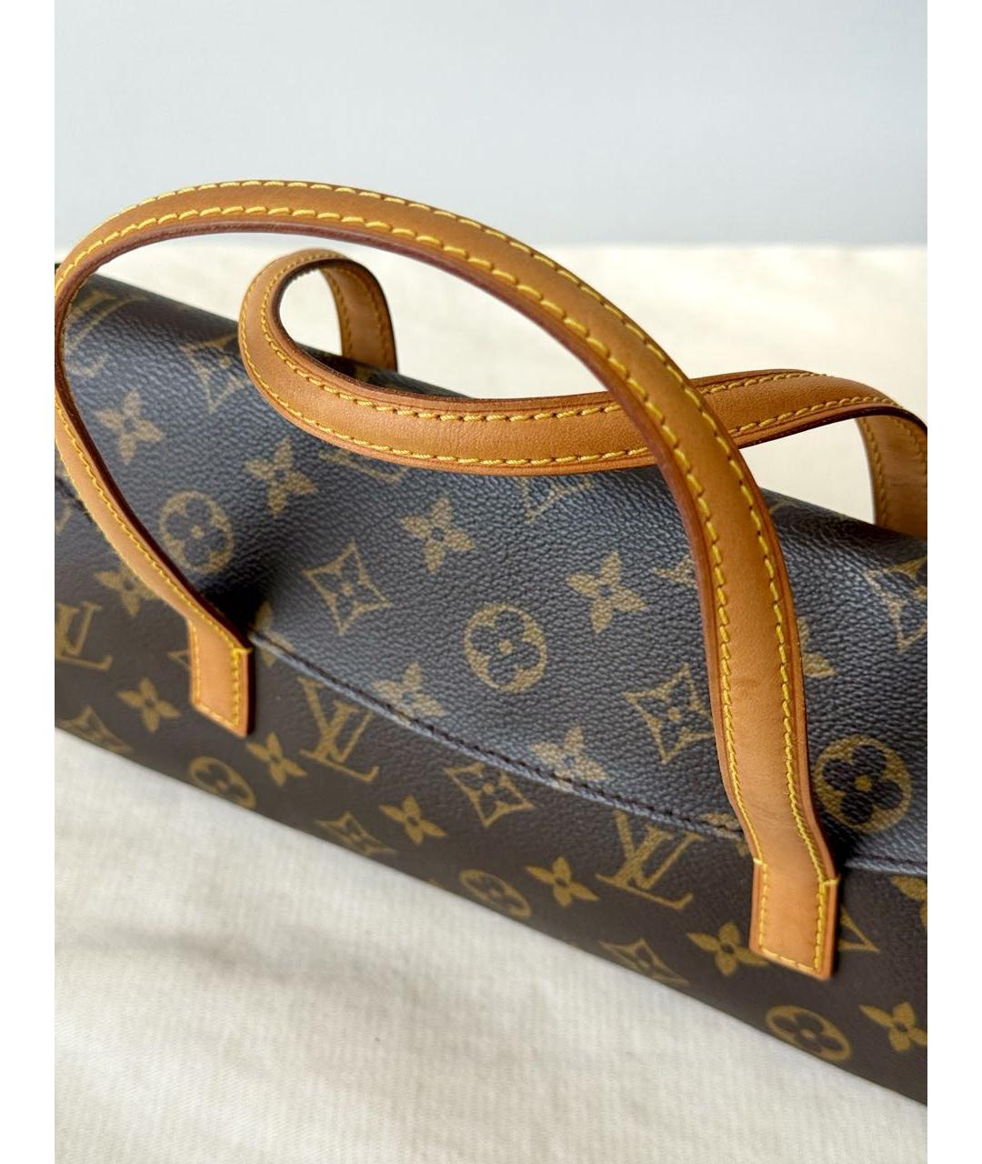 LOUIS VUITTON Коричневая кожаная сумка с короткими ручками, фото 4