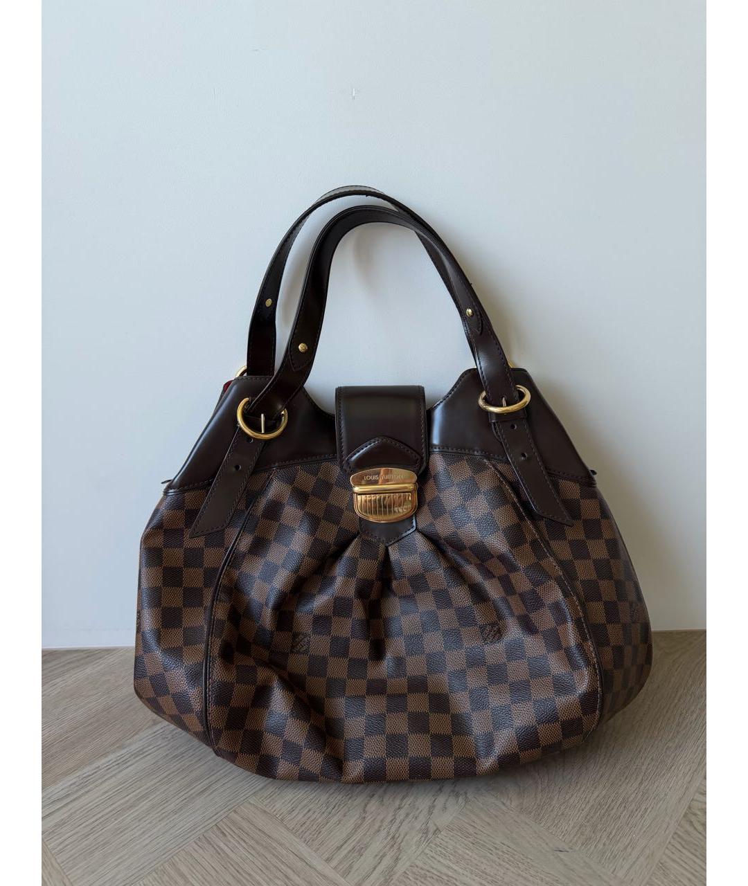 LOUIS VUITTON Коричневая кожаная сумка через плечо, фото 8