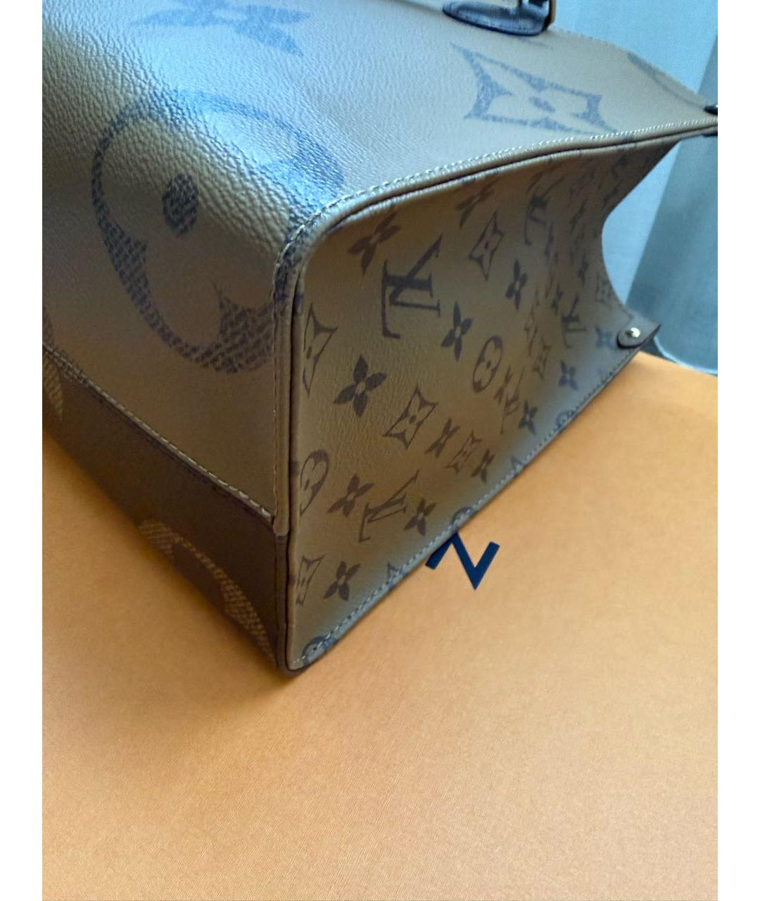 LOUIS VUITTON Коричневая кожаная сумка с короткими ручками, фото 7