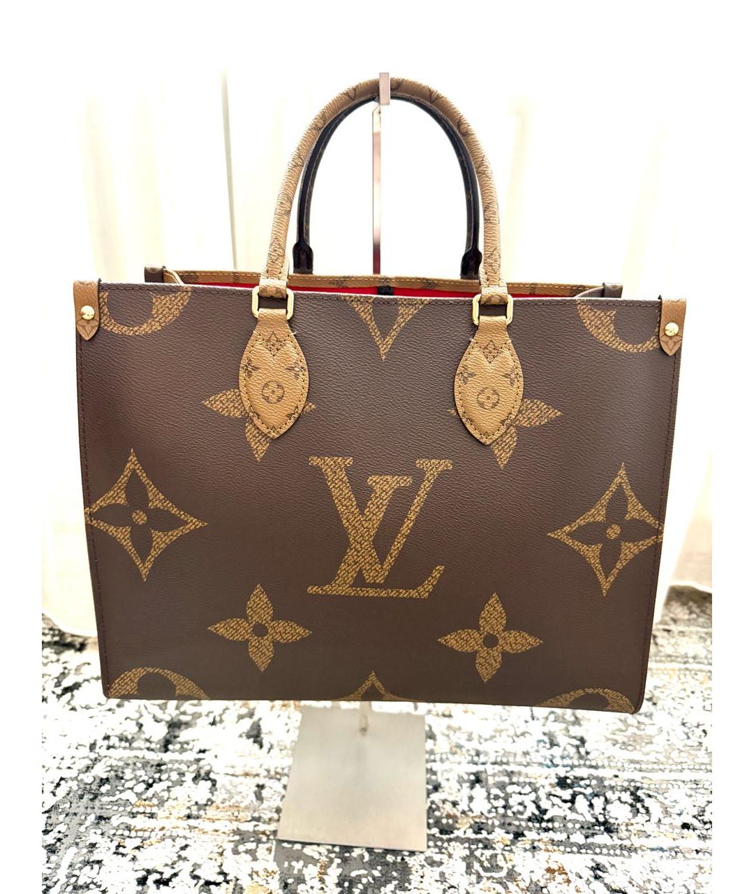 LOUIS VUITTON Коричневая кожаная сумка с короткими ручками, фото 9