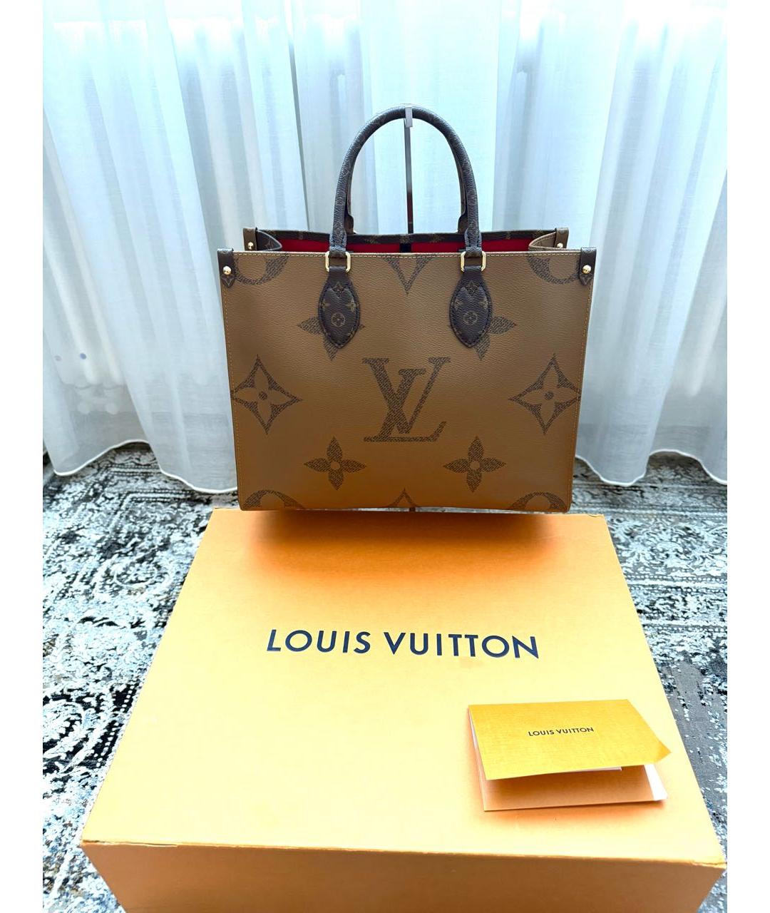 LOUIS VUITTON Коричневая кожаная сумка с короткими ручками, фото 3