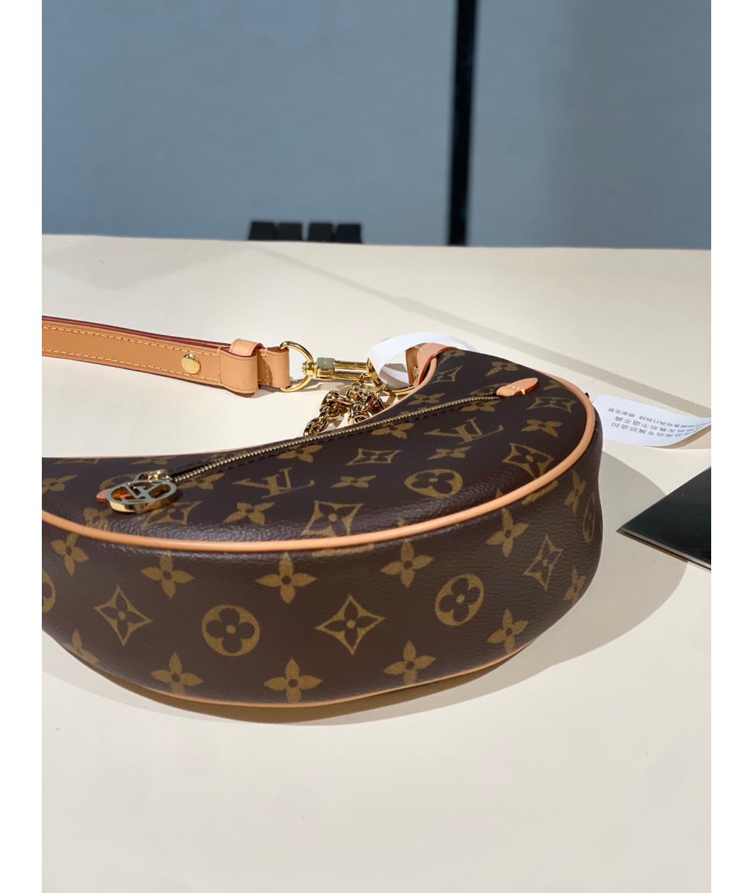 LOUIS VUITTON Коричневая сумка через плечо, фото 5