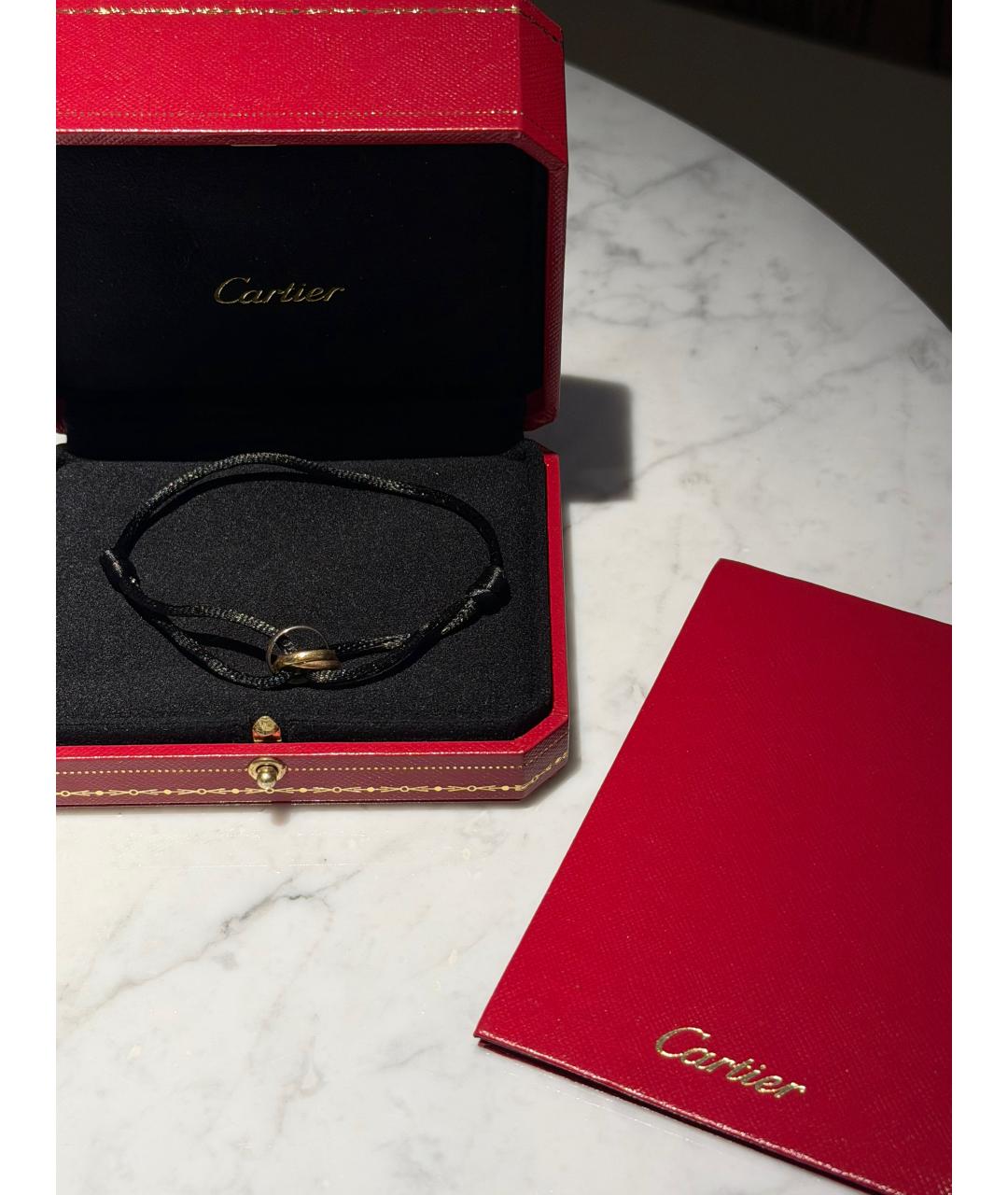CARTIER Черный браслет из желтого золота, фото 4