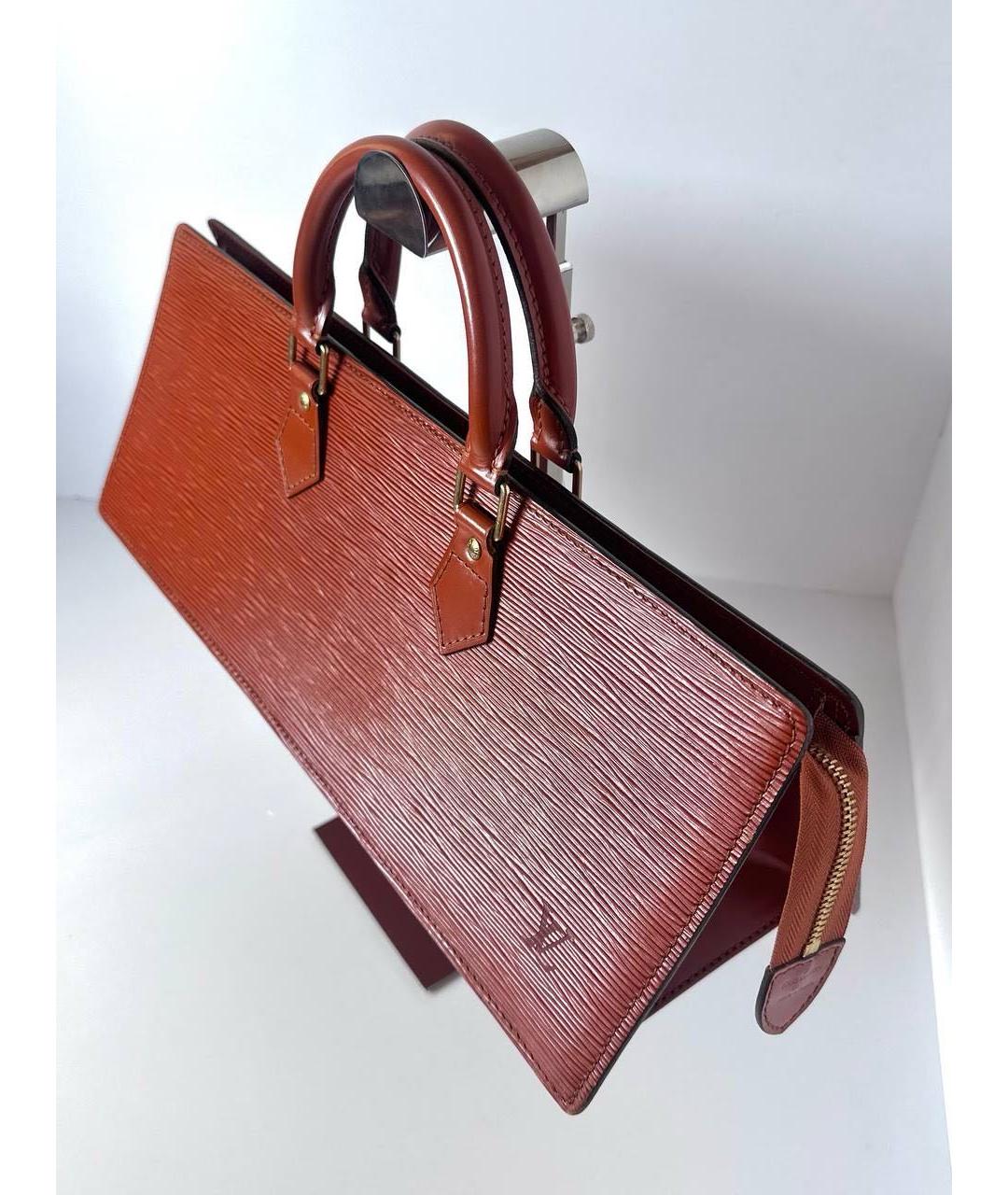 LOUIS VUITTON Коричневая кожаная сумка с короткими ручками, фото 6