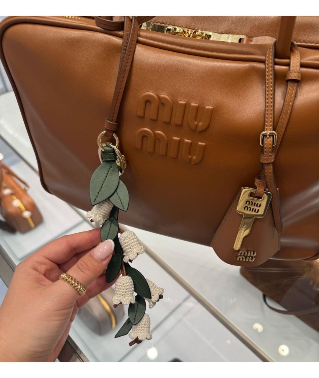 MIU MIU Коричневый брелок, фото 2
