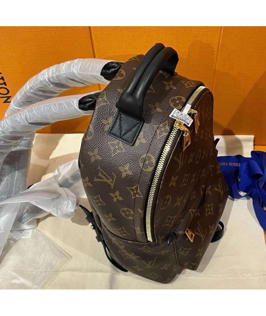 LOUIS VUITTON Коричневый кожаный рюкзак, фото 4