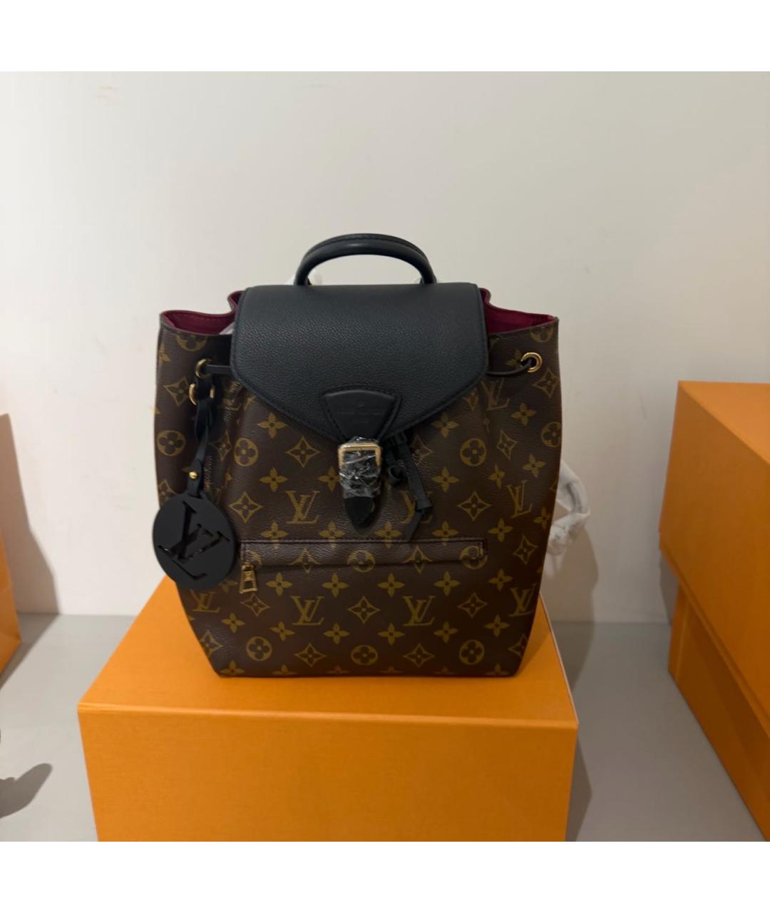 LOUIS VUITTON Коричневый кожаный рюкзак, фото 8