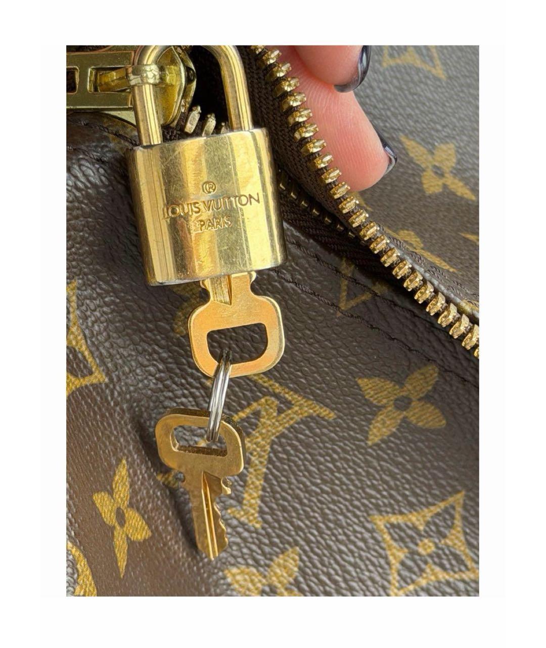 LOUIS VUITTON Коричневая дорожная/спортивная сумка из искусственной кожи, фото 7