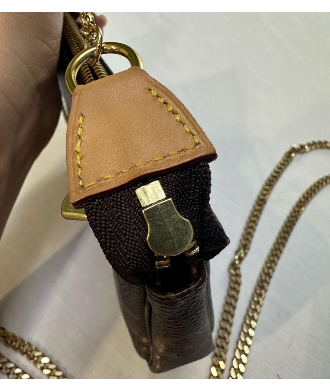 LOUIS VUITTON Коричневая кожаная сумка с короткими ручками, фото 4