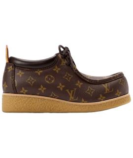LOUIS VUITTON Высокие ботинки