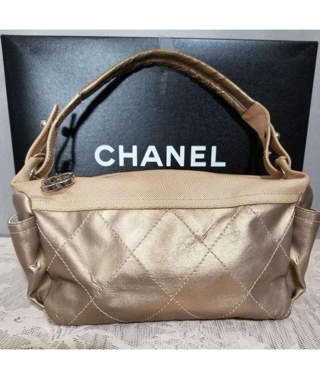 CHANEL Золотая кожаная сумка с короткими ручками, фото 9