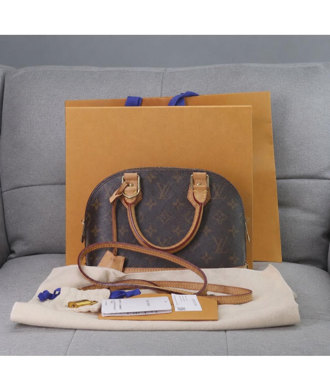 LOUIS VUITTON Коричневая кожаная сумка с короткими ручками, фото 2